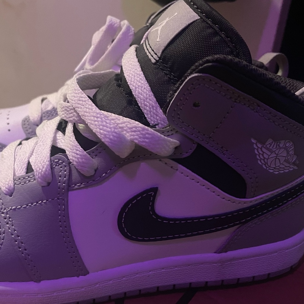 Grey and white retro Jordan 1s